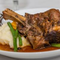 Lamb Shank  · Oven Braised lamb shank with marinara, carrots, onions, celery, our mixed spices served with...