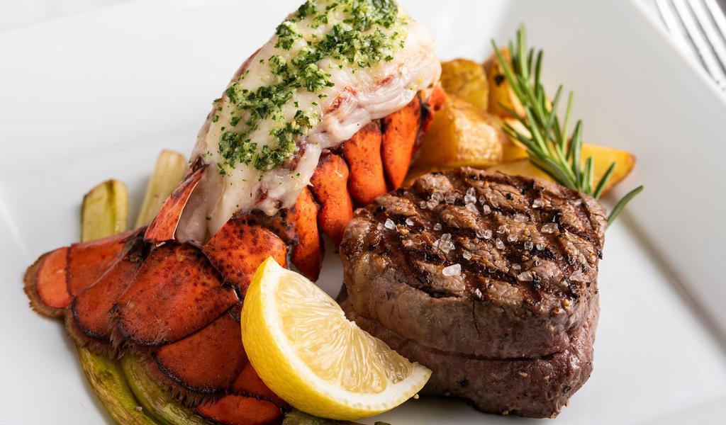 Filet Mignon & Lobster · Tasty and oh so Tender Filet Mignon that just melts in your mouth, paired with a Tender and Buttery Lobster Tail. Comes with a side of creamy mashed potatoes and vegetables