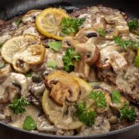Scaloppine Di Vitello · Veal Tenderloin with Mushroom. Served with Vegetables and Mash Potatoes in a Lemon Caper But...