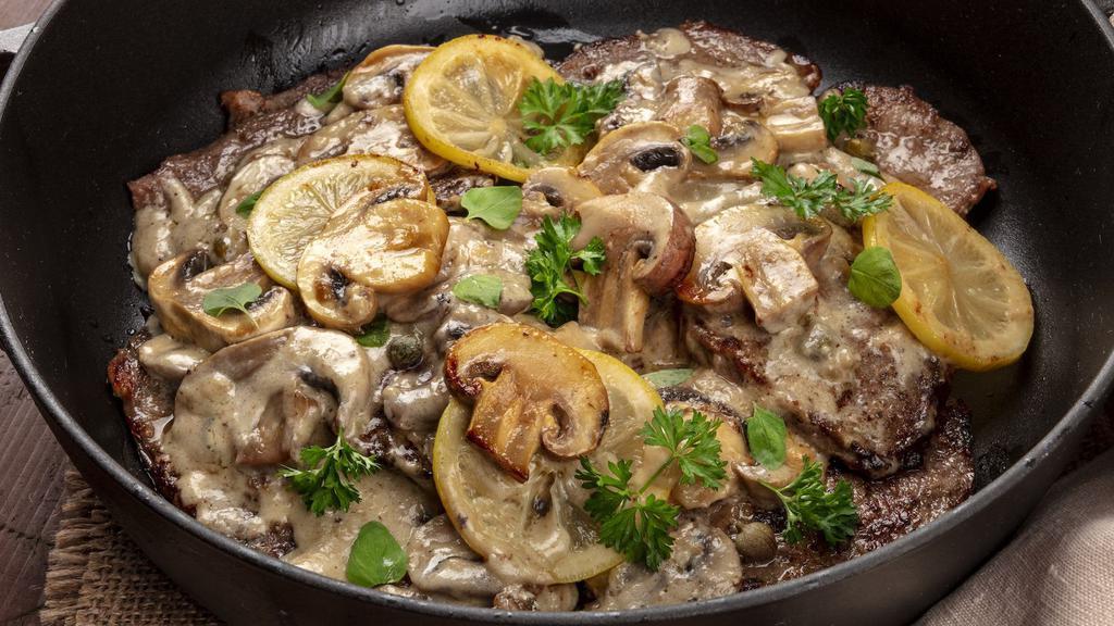 Scaloppine Di Vitello · Veal Tenderloin with Mushroom. Served with Vegetables and Mash Potatoes in a Lemon Caper Butter Sauce.