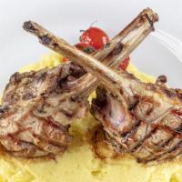 Lamb Rack · Grilled and Seasoned Lamb Rack cooked to perfection. Comes with a side of creamy mashed pota...