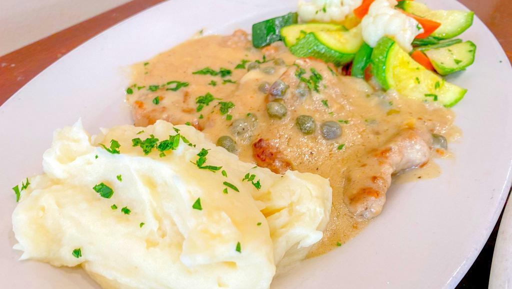 Salmon Piccata · Freshly Grilled and Perfectly Seasoned Salmon Fillet Coated with Creamy Piccata Sauce. Comes with your choice of 2 sides, and a drink