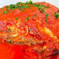 Vegetarian Lasagna · Made with Roasted Vegetables, Zucchini, Carrots, Onions, Spinach, in a Marinara Base Sauce