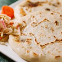 Cheese Pupusa · Pupusa made with corn dough mixed with rice flour filled with Mozzarella cheese and Monterey...