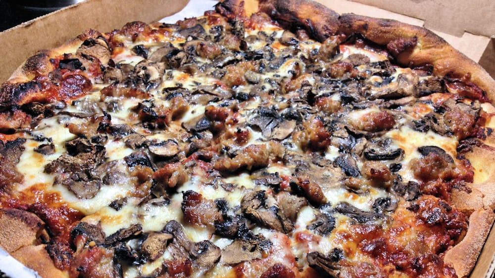12. Pizza Venicia · Cheese, tomato sauce, linguisa and mushrooms.