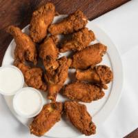 Spicy Chicken Wings · Spicy. Served with your choice of dipping sauce.
