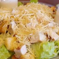 Caesar Salad · Romaine hearts topped with parmesan and croutons in our own Caesar dressing.