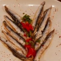 Boquerones GF · ( GF ) Marinated white anchovies, pickled onions, aioli, levain bread