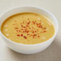 Vegan Red Lentil Soup · Blended red lentil, potato, carrot and onion with cumin and red pepper. Served with pita bre...
