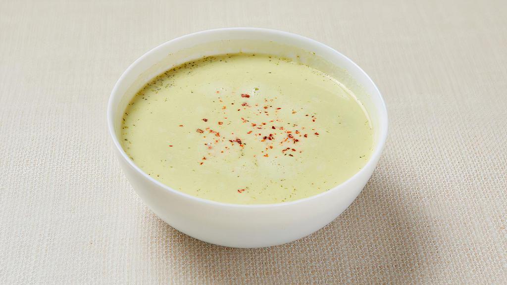 Vegan Broccoli Soup · Blended broccoli and onion with coconut cream. Served with pita bread. Vegan. Gluten-free (no pita).