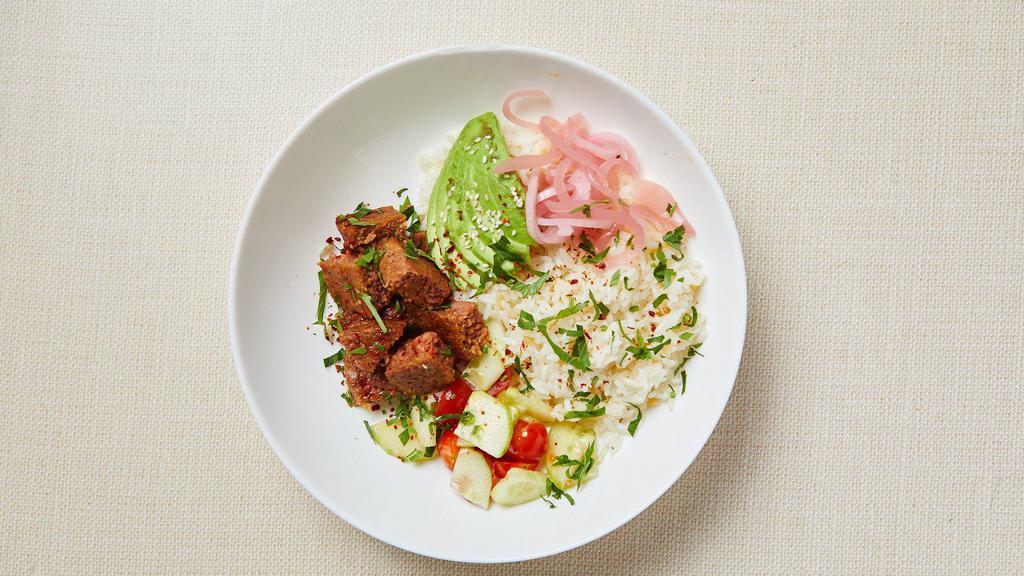 Vegan Beyond Rice Bowl · Beyond (plant-based) meatballs, jasmine rice with gluten free orzo, grape tomato, cucumber, parsley, avocado and pickled red onion. Served with hot sauce. Vegan. Gluten-free.