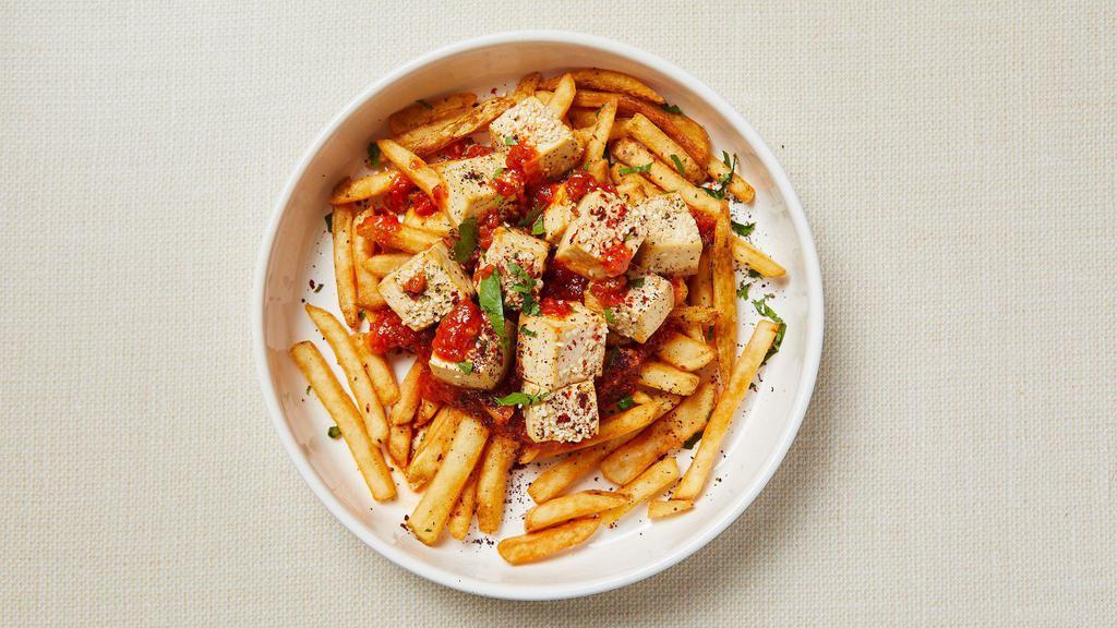 Vegan Tofu Fries Bowl · Gluten-free soy sauce and sesame oil baked tofu with homemade tomato sauce over a bed of crispy french fries. Vegan. Gluten-free.