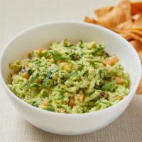 Guacamole · Homemade creamy avocado dip with, onion, tomato, cilantro and lime. Served with gluten-free ...