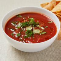 Salsa · Homemade tomato based spicy sauce with onion, jalapeno, serrano, cilantro and lime. Served w...