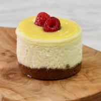Lemon (Puckered Up) Cheesecake · A luscious lemon cheesecake bursting with zesty lemon throughout the cake and finished with ...