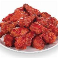 Wings (40 Pcs.) · Traditional or tossed in our Buffalo or Cajun Sweet & Sour sauces, these wings are fried to ...