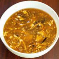 Hot & Sour Soup · Spicy broth simmered with tender bamboo shoots, cubes of soft tofu, egg, black fungus strips...