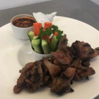 S-2 Bbq Pork Spare Rib Dinner · Thai bbq pork spare ribs with shrimp fried rice. Served with house sauce.