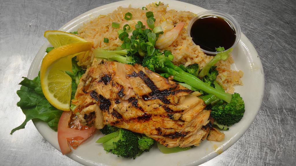 S-12 Teriyaki Salmon Dinner · Fresh salmon fillet grilled to perfection glazed with teriyaki sauce. Served with broccoli and shrimp fried rice.