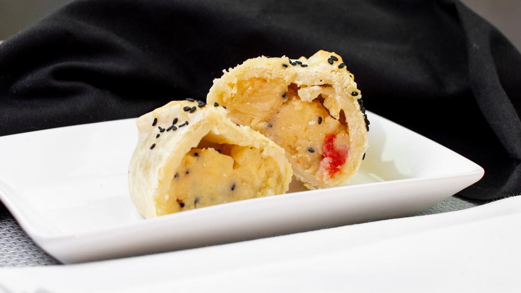 Potato Cheddar Pastie · Yukon gold potatoes, cheddar cheese, some roasted garlic, hand-roasted red bell peppers and a sprinkle of black sesame seeds for crunch. Sold individually.