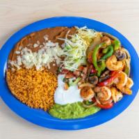 Camarones Fajitas Style · (Shrimp mixed with Grilled Onion, Bell Pepper, Mushroom, Tomato)
Served with:(Rice, Beans, G...