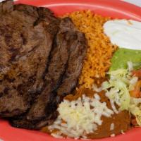 Hot Plate · Steak Slices or Any Meat Option
Served with:(Rice, Beans, Guacamole, Sour Cream, Cheese, Let...