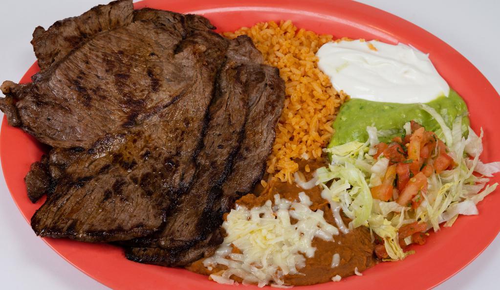 Hot Plate · Steak Slices or Any Meat Option
Served with:(Rice, Beans, Guacamole, Sour Cream, Cheese, Lettuce, Salsa)