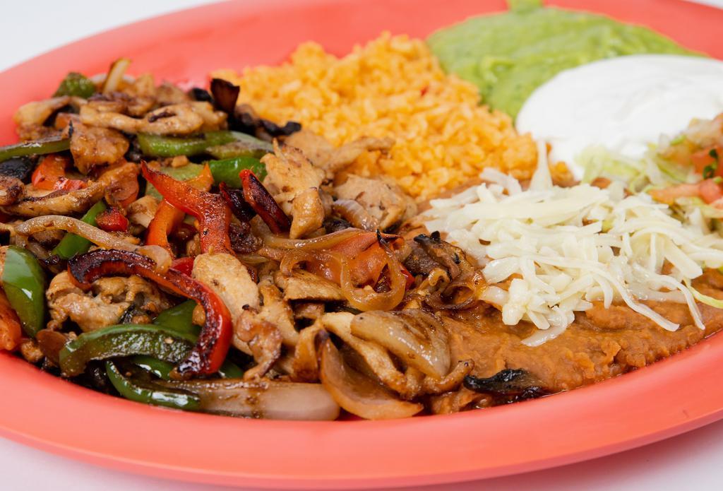 Fajitas Plate · (BEEF or CHICKEN mixed with Grilled Onion, Bell Pepper, Mushroom, Tomato)
                                                      Served with:(Rice, Beans, Guacamole, Sour Cream, Cheese, Lettuce, Salsa)