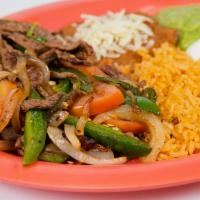 Ranchero Plate · BEEF or CHICKEN mixed with Grilled Onions, Jalapenos, Tomato
Served with:(Rice, Beans, Guaca...