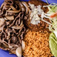 Encebollado · (Beef mixed with Grilled Onions)
Served with:(Rice, Beans, Guacamole, Sour Cream, Cheese, Le...