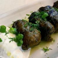 Dolmathes · Grape Leaves - Rice - Aromatic Spices - Dill -  Pine Nuts - Tomato