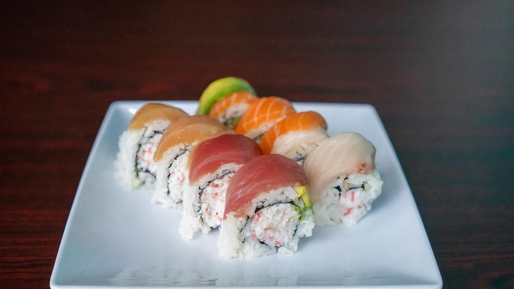 Rainbow Roll · Raw. Crab and avocado, with assortment fish on top.