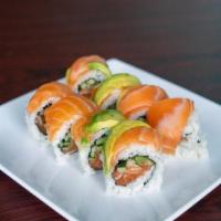 Omega Roll · Raw. Salmon and cucumber, topped with salmon and avocado.