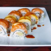 Tropical Roll · Raw. Crab and pineapple, topped with salmon, mango, and unagi sauce.