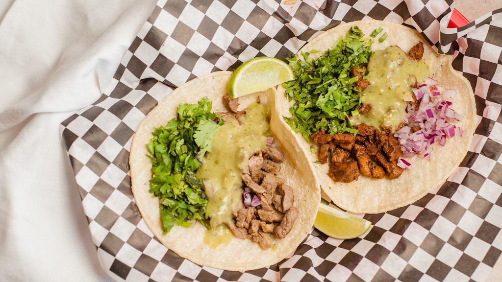 Street Style Tacos · Steak, chicken or al pastor. Served with onions, cilantro and salsa.