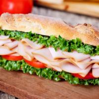 Smoked Turkey Sandwich · Delicious sandwich topped with Smoked Turkey, lettuce, tomato, onion, pickles, peppers, mayo...