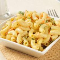 Macaroni Salad · Delicious macaroni topped with melted cheese.