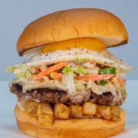 Slaw Burger · impossible patty, white American cheese, fries, haus slaw, fried egg, mayo