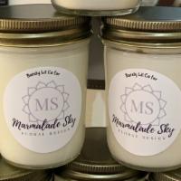 Candles - 8oz · Marmalade Sky Floral signature scent.  Candles locally made by Barely-Lit Candles.