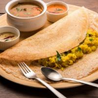 Masala Dosa · Classic South Indian thin crepe made of rice & lentil filled with seasoned potato masala. Se...