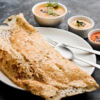 Onion Rava Masala Dosa · Popular Dosa with a difference - made with semolina topped with chopped onions & filled with...