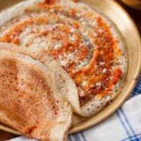 Andhra Kara Dosa · Classic South Indian thin crepe made of rice & lentil spread with spicy Andhra chutney.