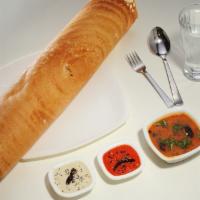 Butter Dosa · Classic South Indian crispy thin cone shaped crepe made of rice & lentil topped with butter.