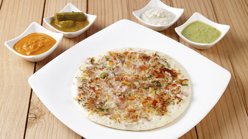 Onion Dosa · Classic South Indian thin crepe made of rice & lentil topped with chopped onions.
