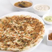 Onion Uthappam · South Indian soft pancake made of rice & lentil topped with chopped onions.