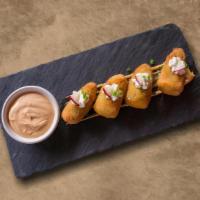 Jalapeno Poppers · Lightly breaded and fried Jalapeno poppers.