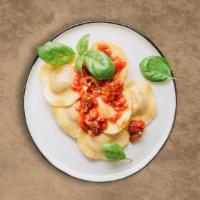 Meat Sauce Ravioli · Fresh cooked ravioli smothered in meat sauce.