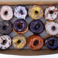 Dozen Assorted Donuts · Top seller. Twelve of the daily flavors available. Baker's choice. For orders of 36 donuts o...