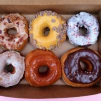 Half-Dozen Assorted Donuts · Popular. Six of the daily flavors available. Baker's choice. For orders of 36 donuts or more...