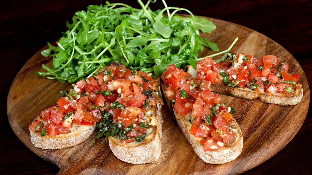 Bruschetta Salad · Vegetarian. Toasted bread, garlic, chopped tomatoes, and extra virgin olive oil. Served with bread.
